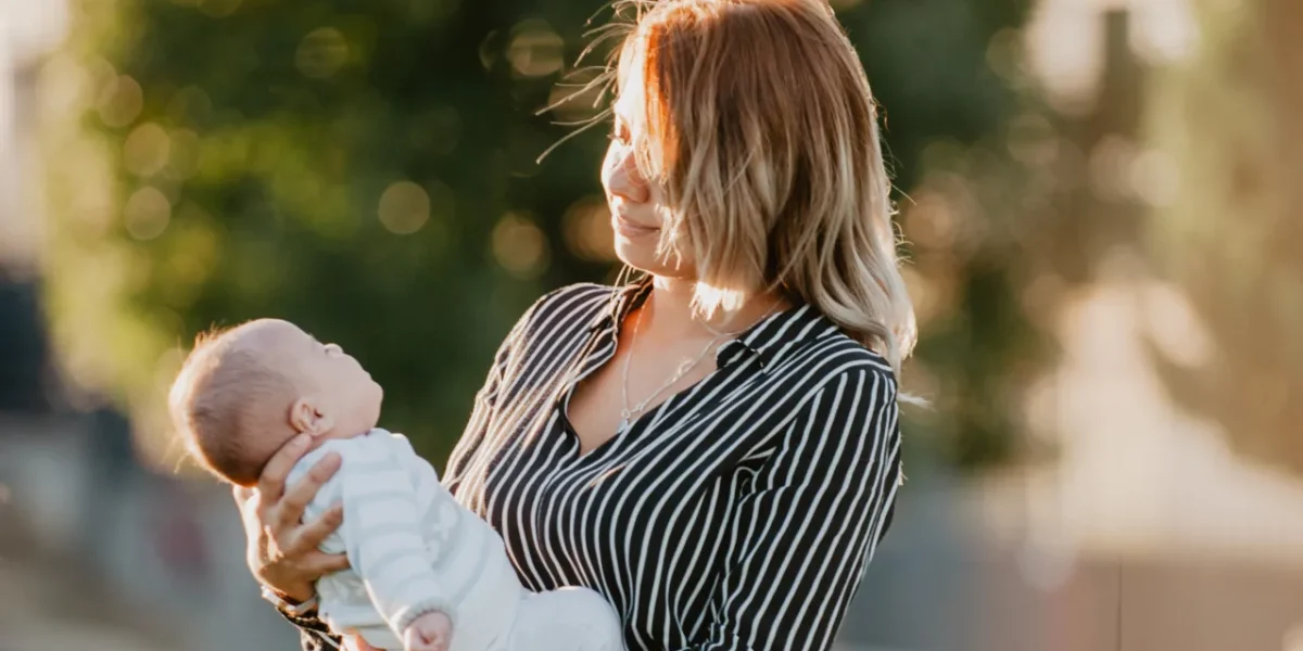 young-mother-and-his-baby-with-down-syndrome-2023-11-27-04-54-04-utc